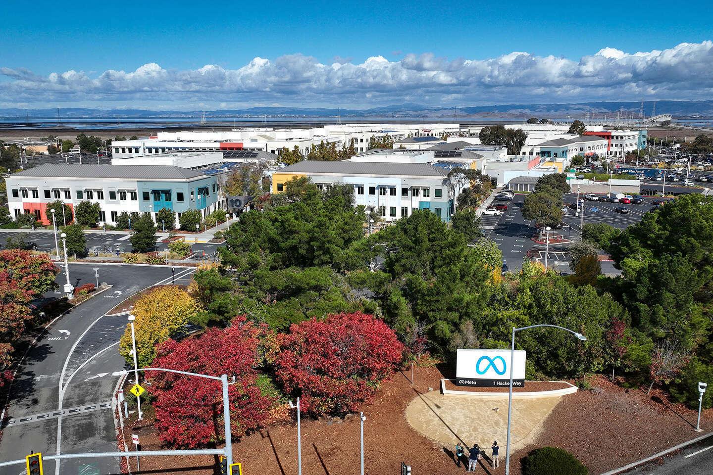 Aerial view of Meta headquarters in Menlo Park with the Meta sign at 1 Hacker Way.