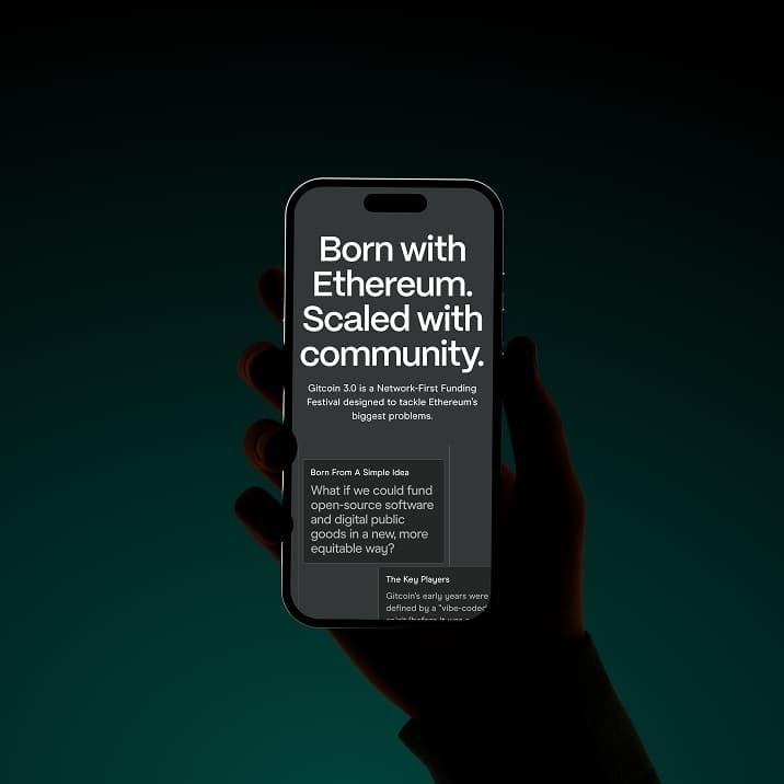 Hand holds a phone showing "Born with Ethereum. Scaled with community."