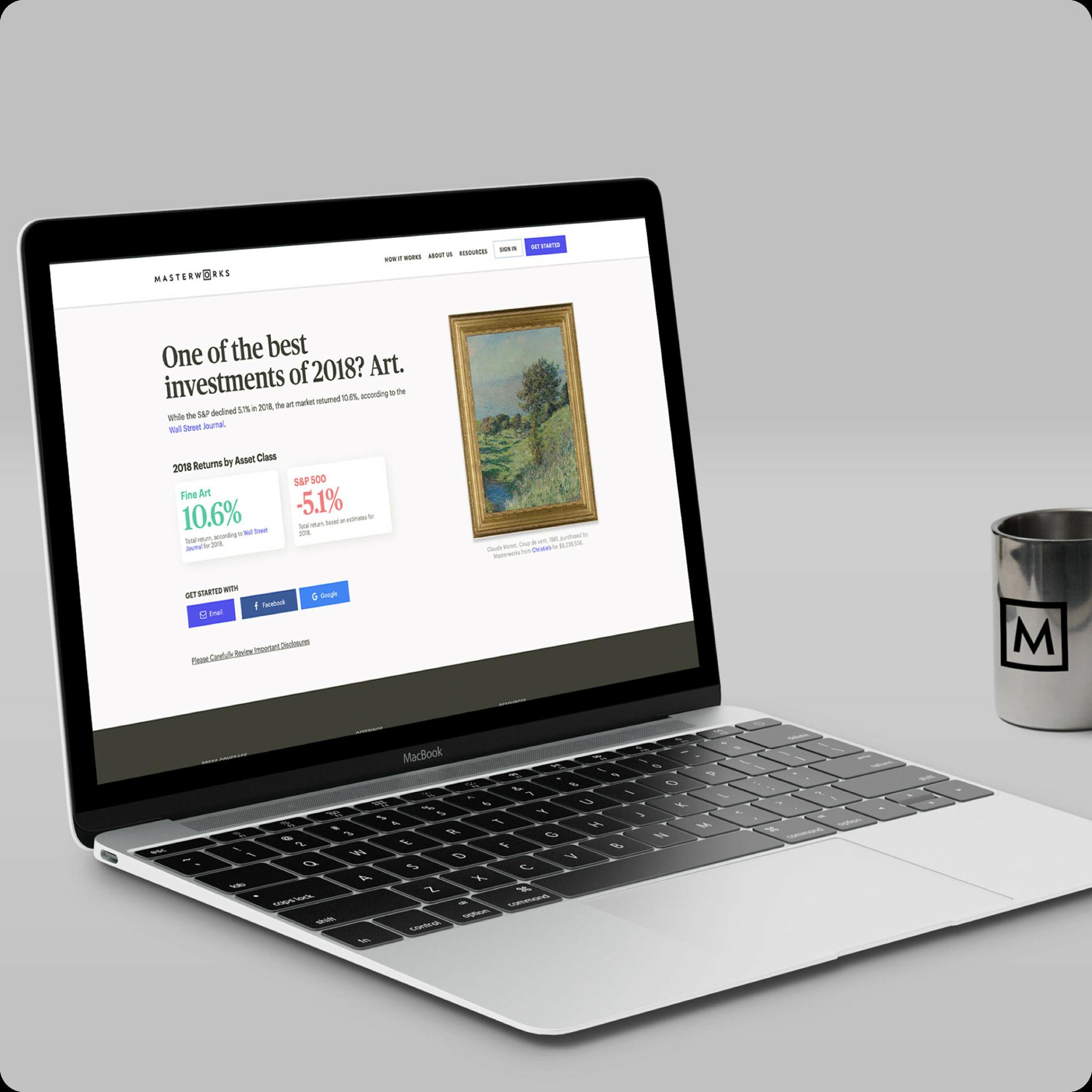 Laptop showing the Masterworks art investment website beside a mug