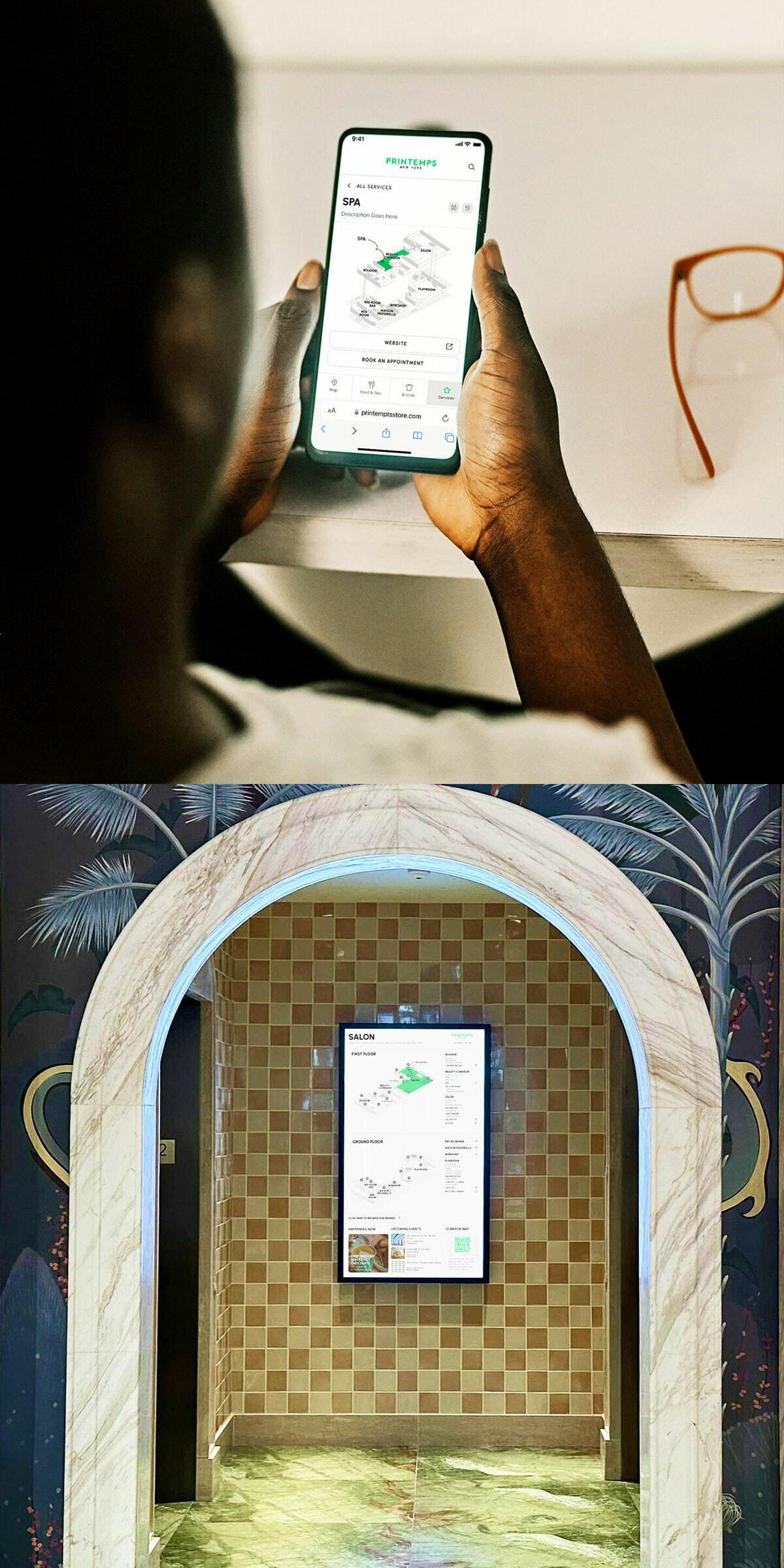 Person using a spa navigation app above a digital wayfinding display in an arched hallway