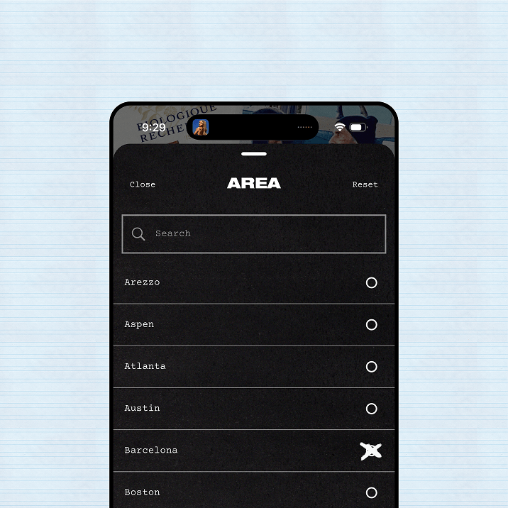 Phone screen showing an area selection list with Barcelona selected
