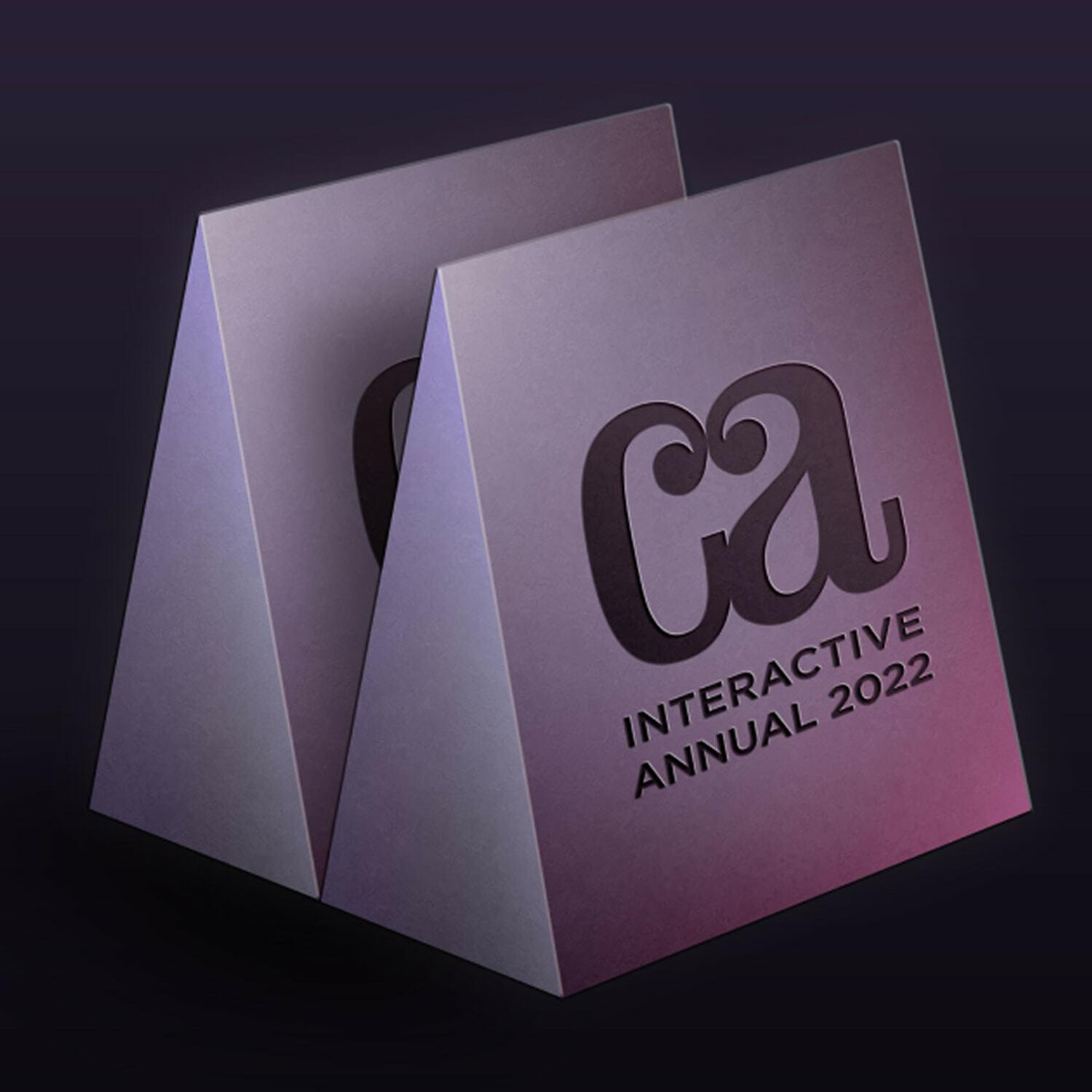 CA Interactive Annual 2022 folded cards on dark background