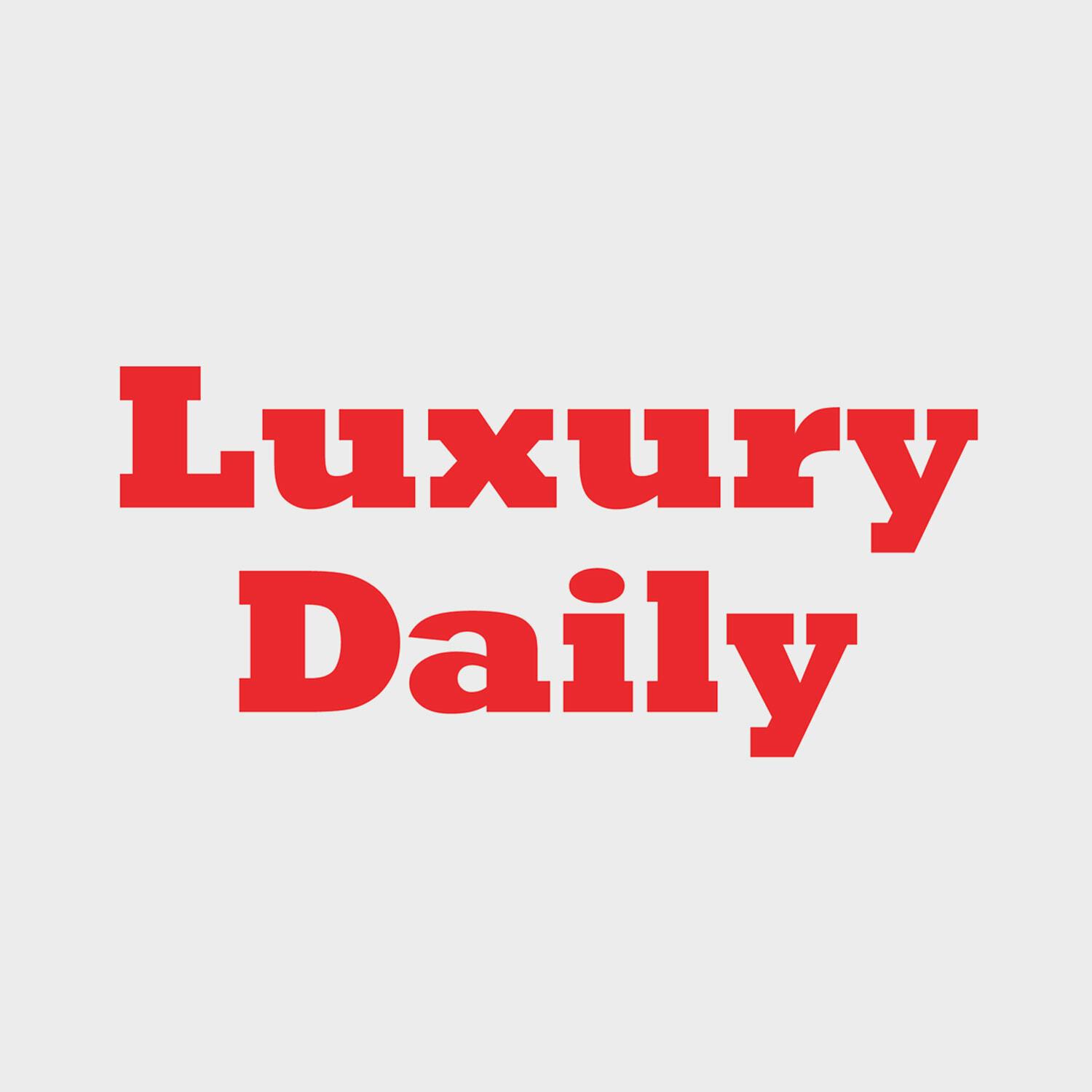 Luxury Daily red wordmark on light gray background
