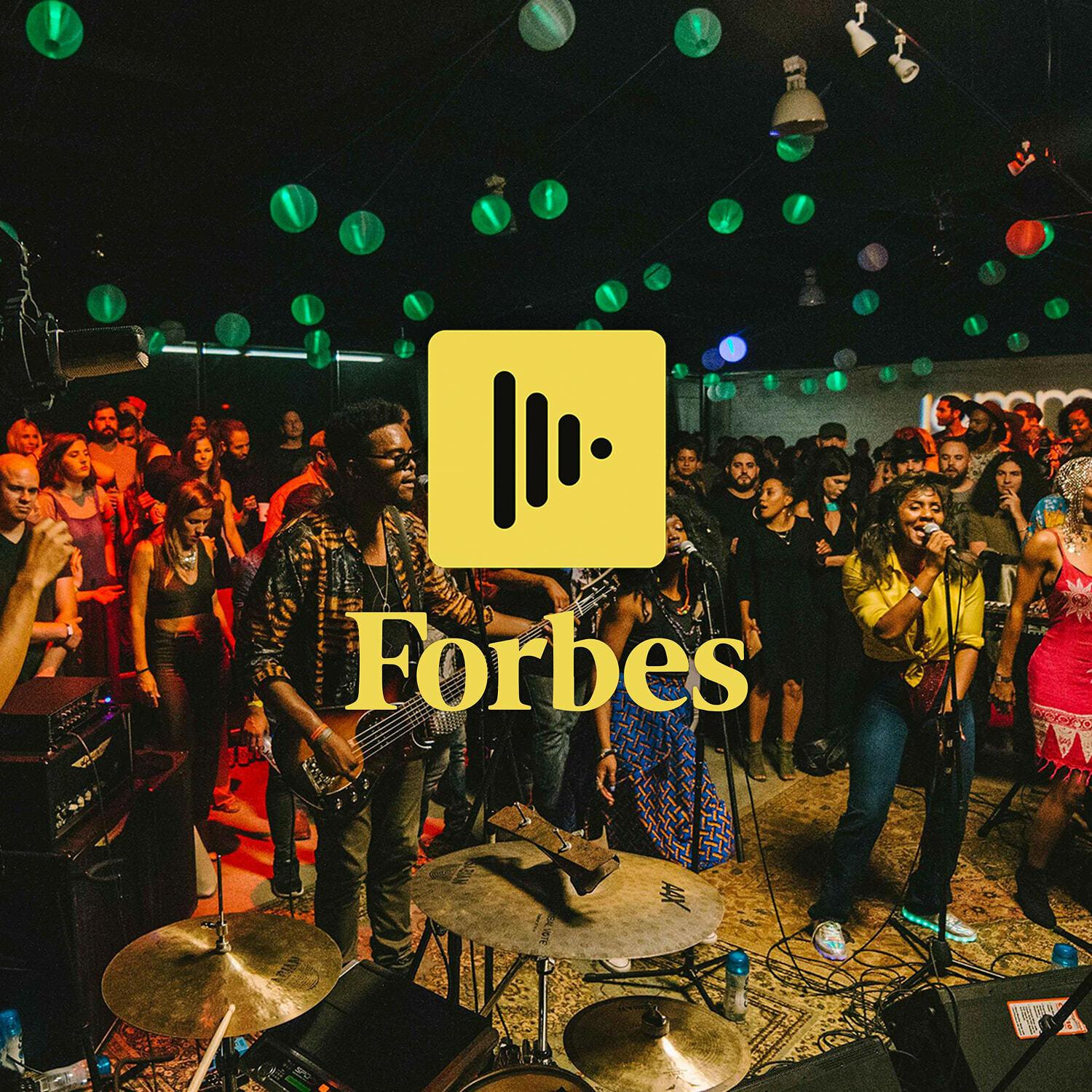Live band performance with Forbes text and app icon overlay