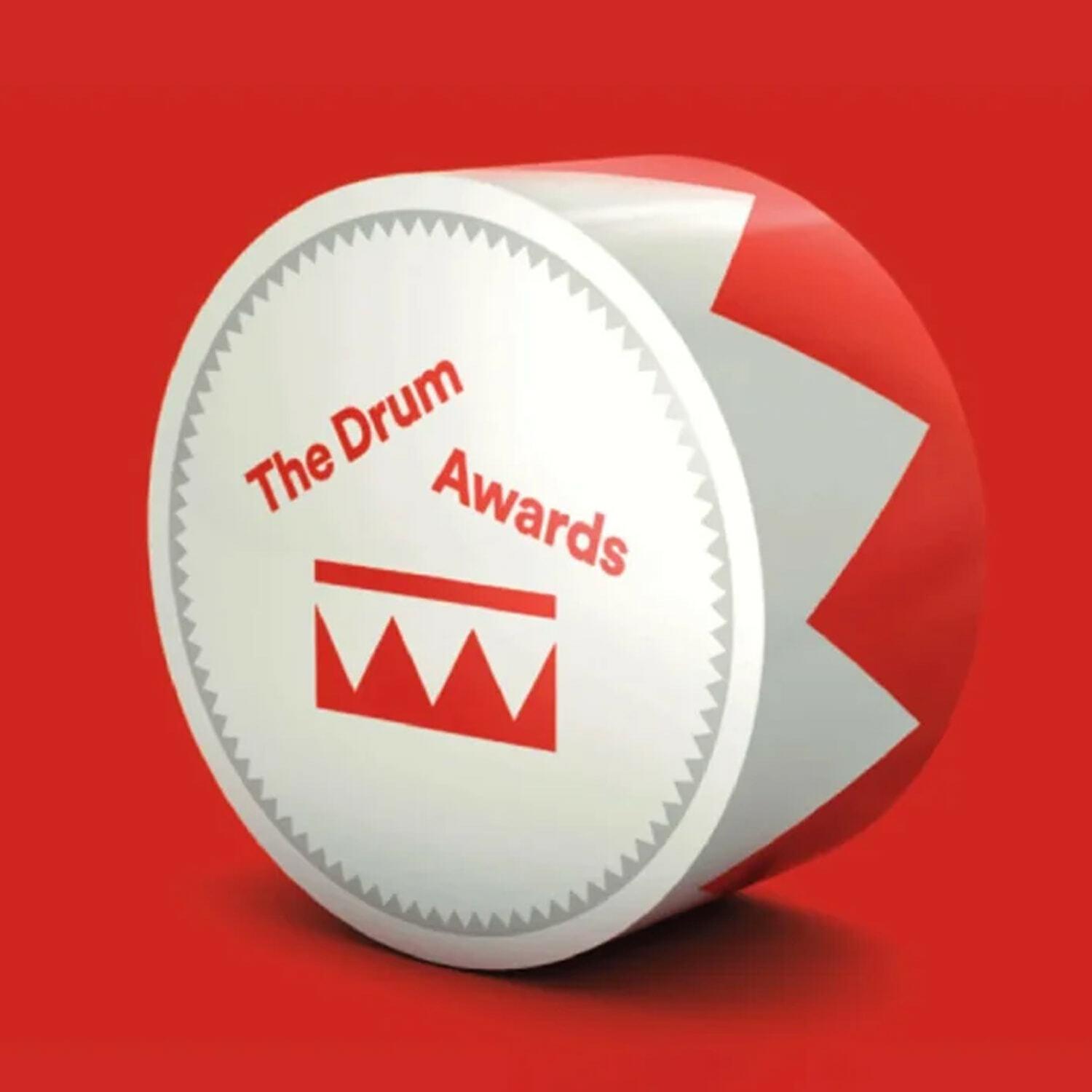 The Drum Awards 3D badge on a red background