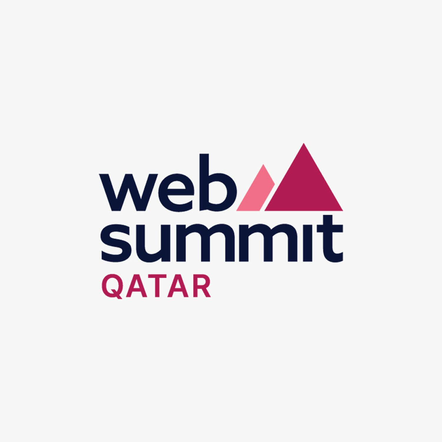 Web Summit Qatar logo with pink triangle mark