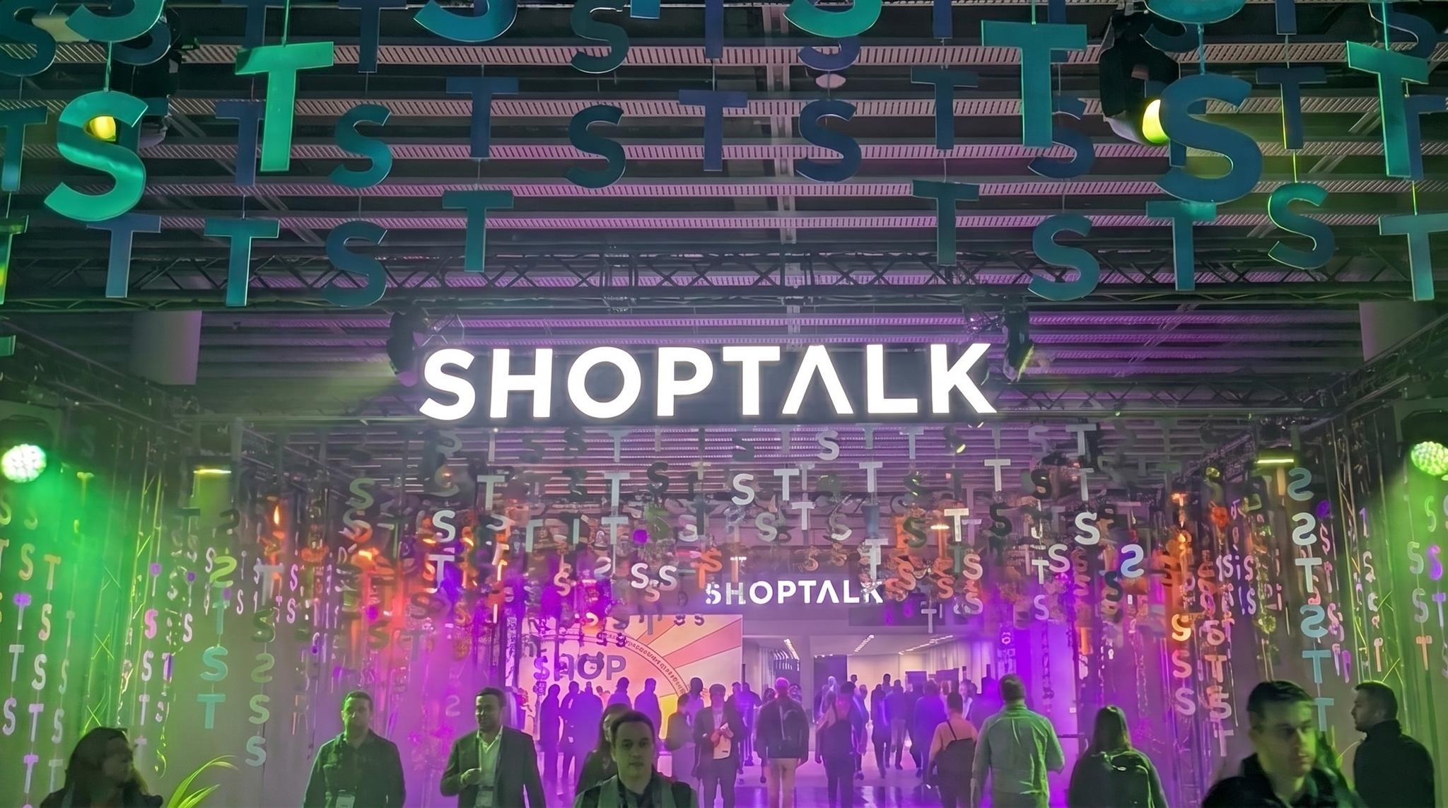Shoptalk event entrance with hanging letters and attendees
