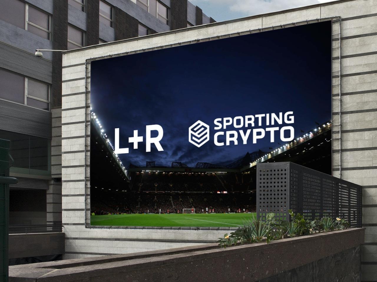 Outdoor billboard showing L+R and Sporting Crypto over a stadium scene